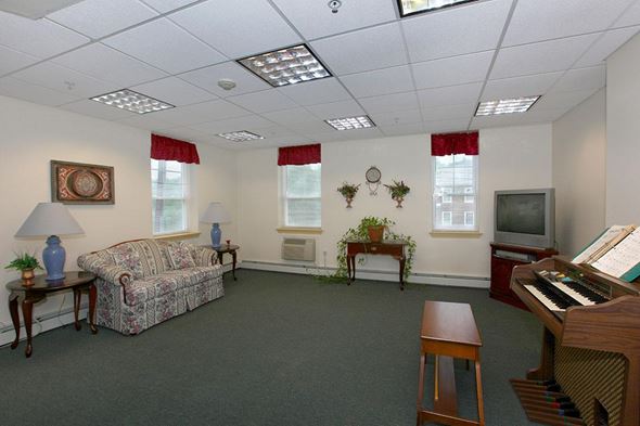Westfield apartment for rent - a living room with a piano and a couch