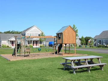 Edgartown apartment for rent - a playground with a house and a picnic table