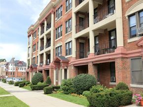 Dorchester apartment for rent - a large brick building with a sidewalk in front of it
