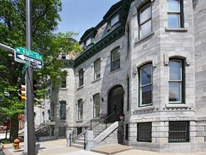 Philadelphia apartment for rent - a stone building with a street sign in front of it