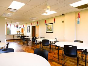 University Park apartment for rent - a dining room with tables and chairs in a cafeteria
