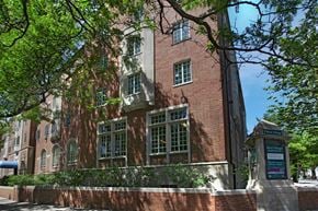 New Haven apartment for rent - a large brick building with trees in front of it