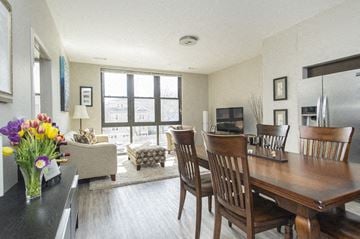 Allston apartment for rent - a dining room and living room with a table and chairs