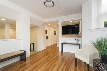 Allston apartment for rent - a living room with a couch and a television