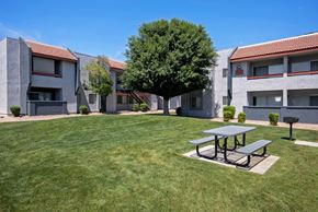Phoenix apartment for rent - Exterior Building with Outdoor Picnic Area at West 35th Apartments, Phoenix, 85053