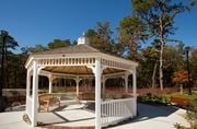 Waretown apartment for rent - a white gazebo with benches and trees in the background