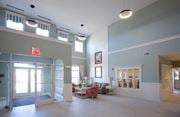 Waretown apartment for rent - a lobby with a seating area and a door into a building