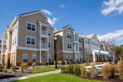 Waretown apartment for rent - an apartment building with a sidewalk in front of it