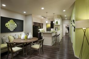 Tucson apartment for rent - a dining room and kitchen with a table and chairs