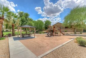 Hereford house for rent - a playground with a slide and a picnic table in a park