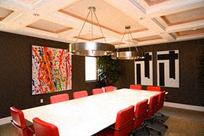 Los Angeles apartment for rent - a conference room with a long table and red chairs