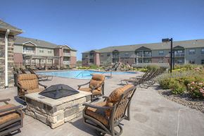 Lincoln townhouse for rent - our apartments offer a pool and lounge area with chairs