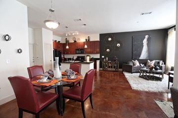 Houston apartment for rent - a dining room and living room with a table and chairs