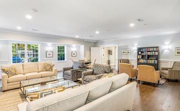 Hanover apartment for rent - a living room with couches and chairs and a glass table