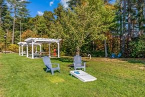 Hanover apartment for rent - a backyard with two chairs and a table and a gazebo
