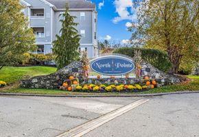 Hanover apartment for rent - the sign for north pointe at the entrance to a street with pumpkins on