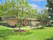 Columbus townhouse for rent - the front of a brick house with trees