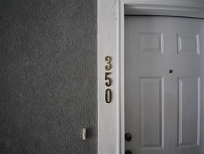 Provo condo for rent - a white door with the number three on it