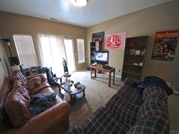 Provo condo for rent - a living room with couches and a tv