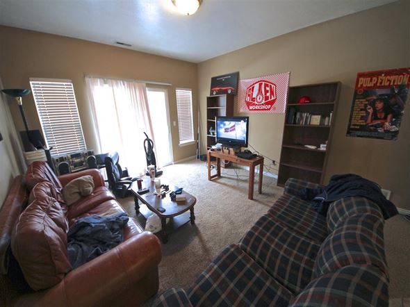 Provo condo for rent - a living room with couches and a tv