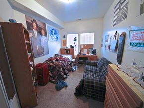 Provo condo for rent - a dorm room with a bed and a desk