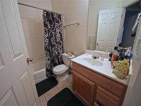 Provo condo for rent - a bathroom with a sink toilet and a shower