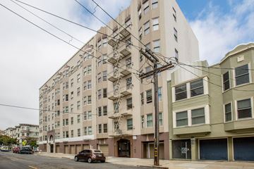 San Francisco apartment for rent - A large building with a fire escape on the side.