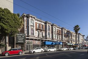 San Francisco apartment for rent - A row of old buildings with a sign that says Sandwiches and Breakfast.