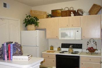 Kitchen includes microwave oven