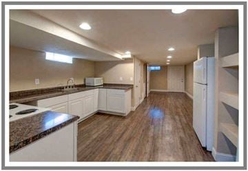 Denver apartment for rent - a large kitchen with a stove and a refrigerator