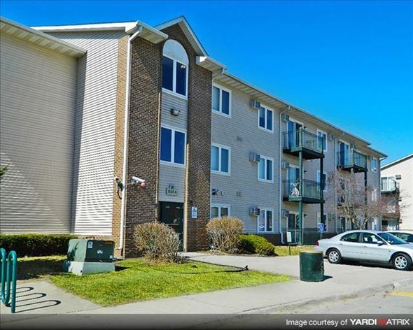 Des Moines apartment for rent - an apartment building with a car parked in front of it