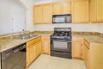 Kitchen with dishwasher and oven