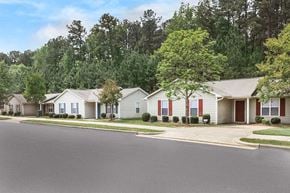 Durham apartment for rent - a neighborhood of white houses with red shutters and trees