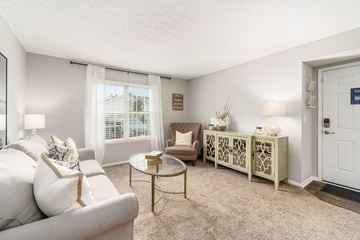 Lewis Center apartment for rent - a living room with a couch and a table