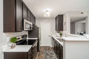 Lewis Center apartment for rent - a kitchen and dining room with a table and chairs