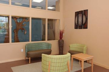 Pittsburgh apartment for rent - a living room with two chairs and a table