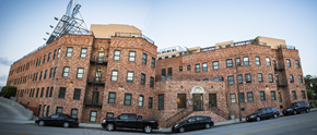 Los Angeles apartment for rent - a large brick building on a city street