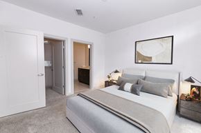 Atlanta apartment for rent - a bedroom with a bed and a door to a bathroom
