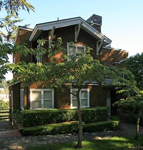 San Francisco apartment for rent - a brick house with a tree in front of it
