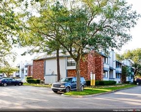 Kenner apartment for rent - a car parked in front of an apartment building