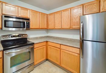 Large kitchens with oak cabinetry