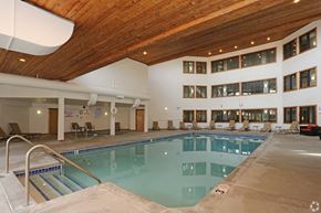 Brown Deer apartment for rent - Indoor pool with high ceiling and lounge seating