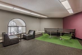 Eagan apartment for rent - Business center with a variety of seating and tables