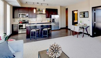 Broadloom carpet and plank flooring