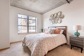 Minneapolis apartment for rent - Bedroom with bed and a nightstand