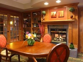 St. Paul apartment for rent - a dining room with a table and chairs and a fireplace