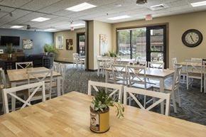 St. Paul apartment for rent - Community room with wooden tables and chairs