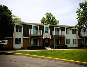 Ofallon apartment for rent - an apartment building with two balconies and a street in front