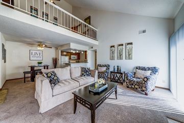 St. Charles apartment for rent - a living room with a couch and a coffee table