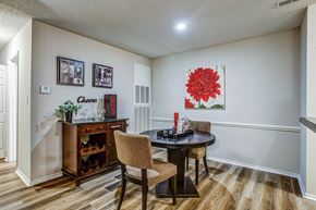 Chesterfield townhouse for rent - a dining room with a table and chairs next to a doorway